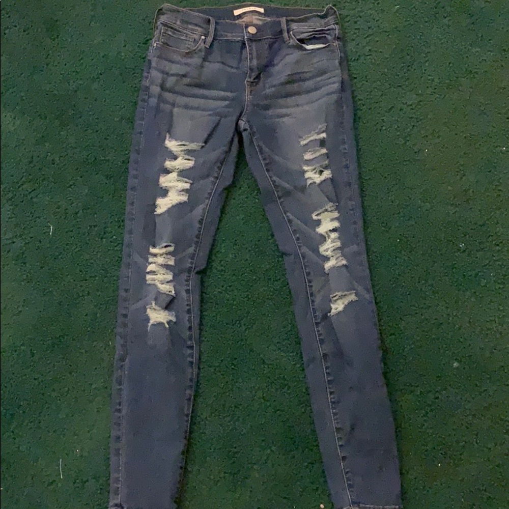 blue ripped jeans